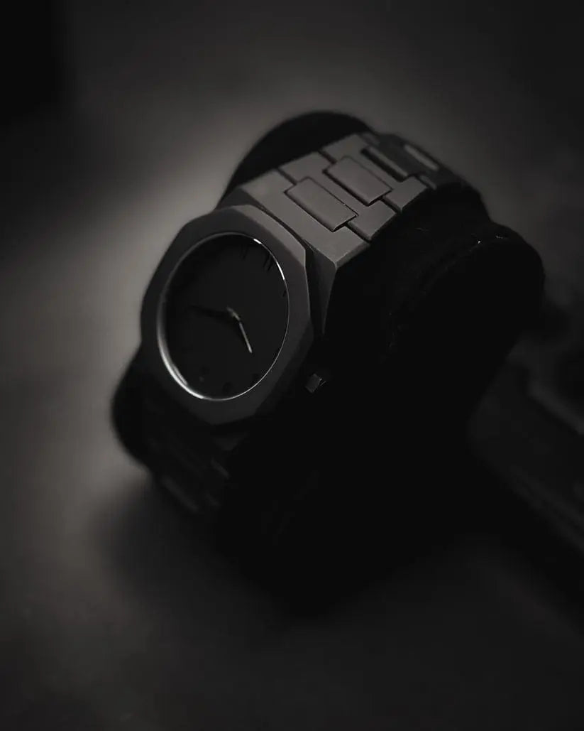 Flat Lay of Black Arabic Watch – Modern Minimal Aesthetic